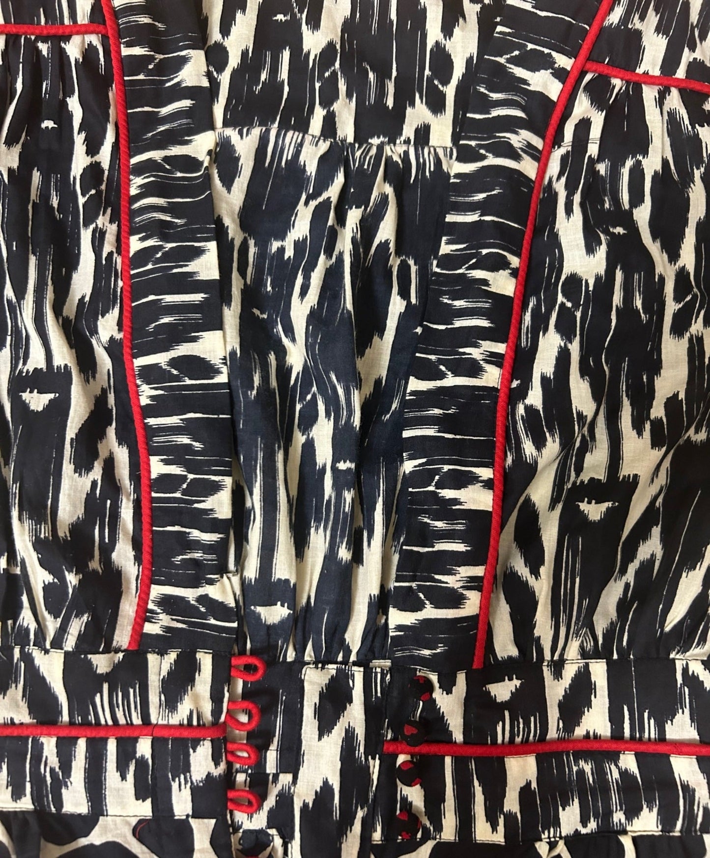 Plunging neckline romper in animal print with side pockets